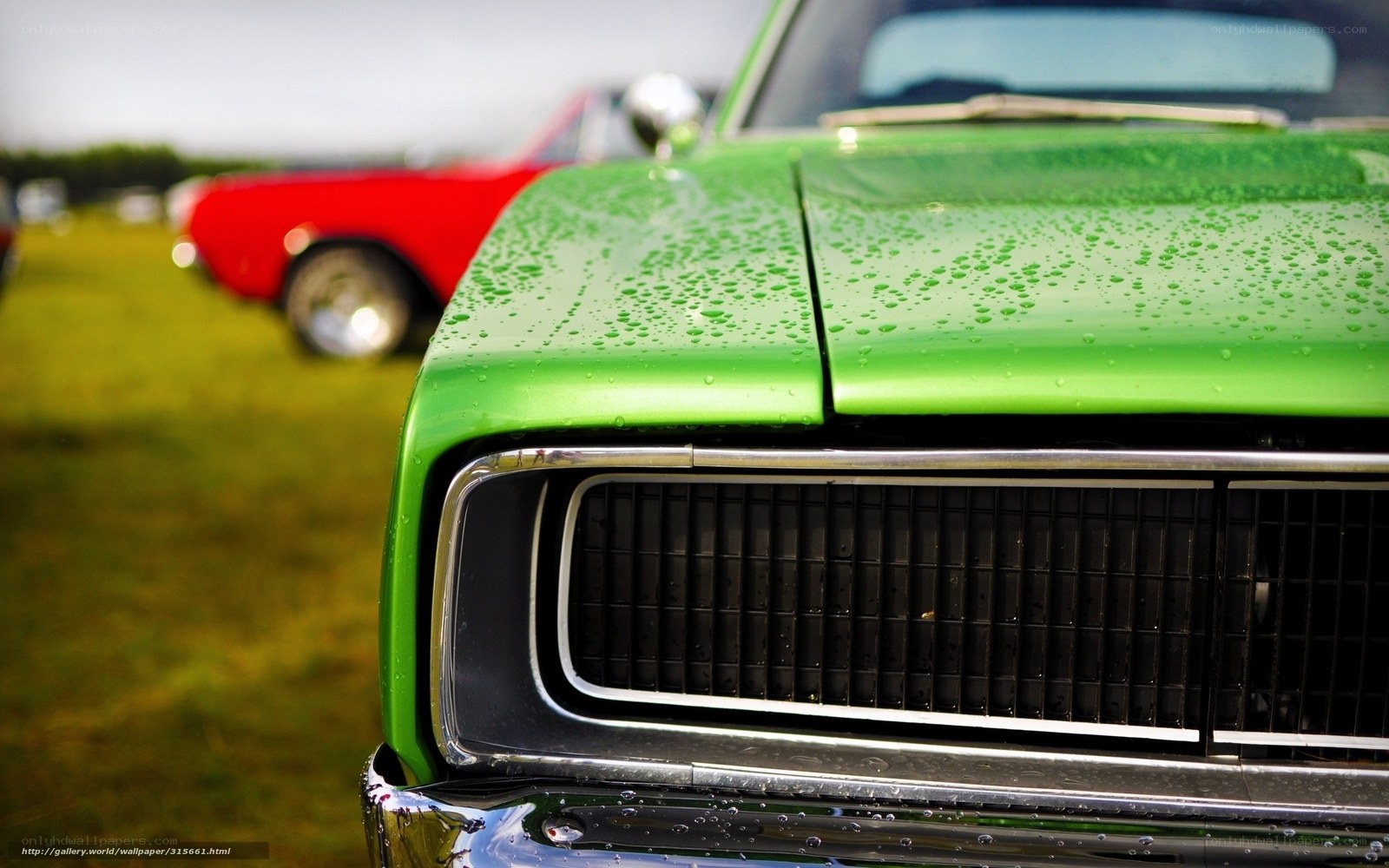 green classic car at car show