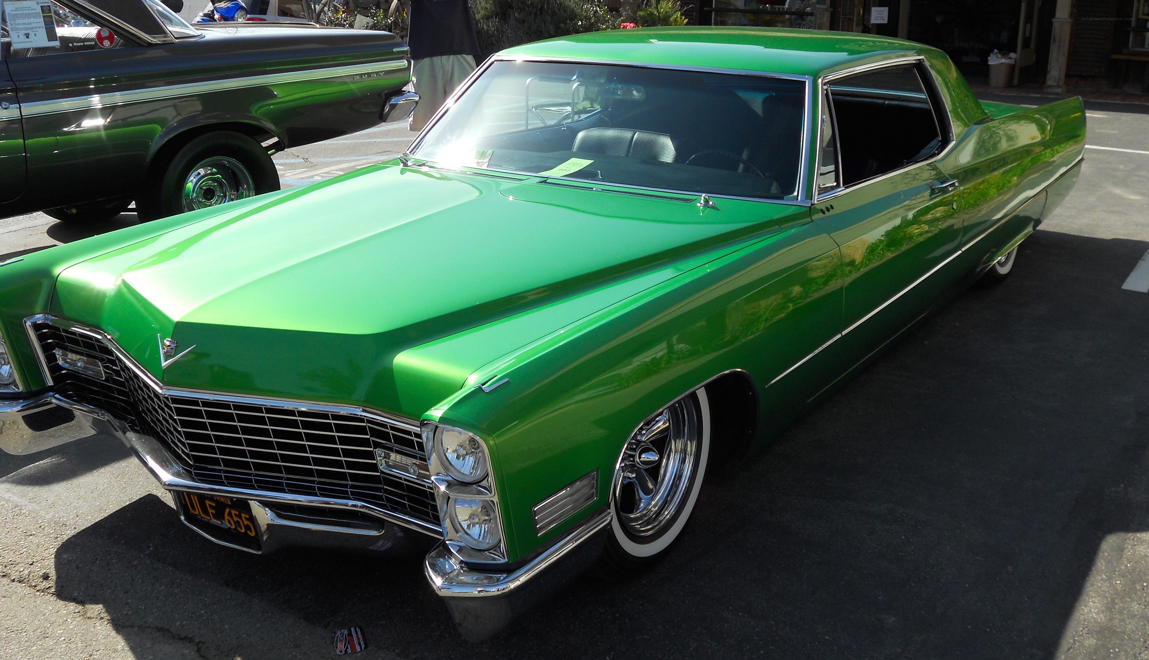 green classic car at show