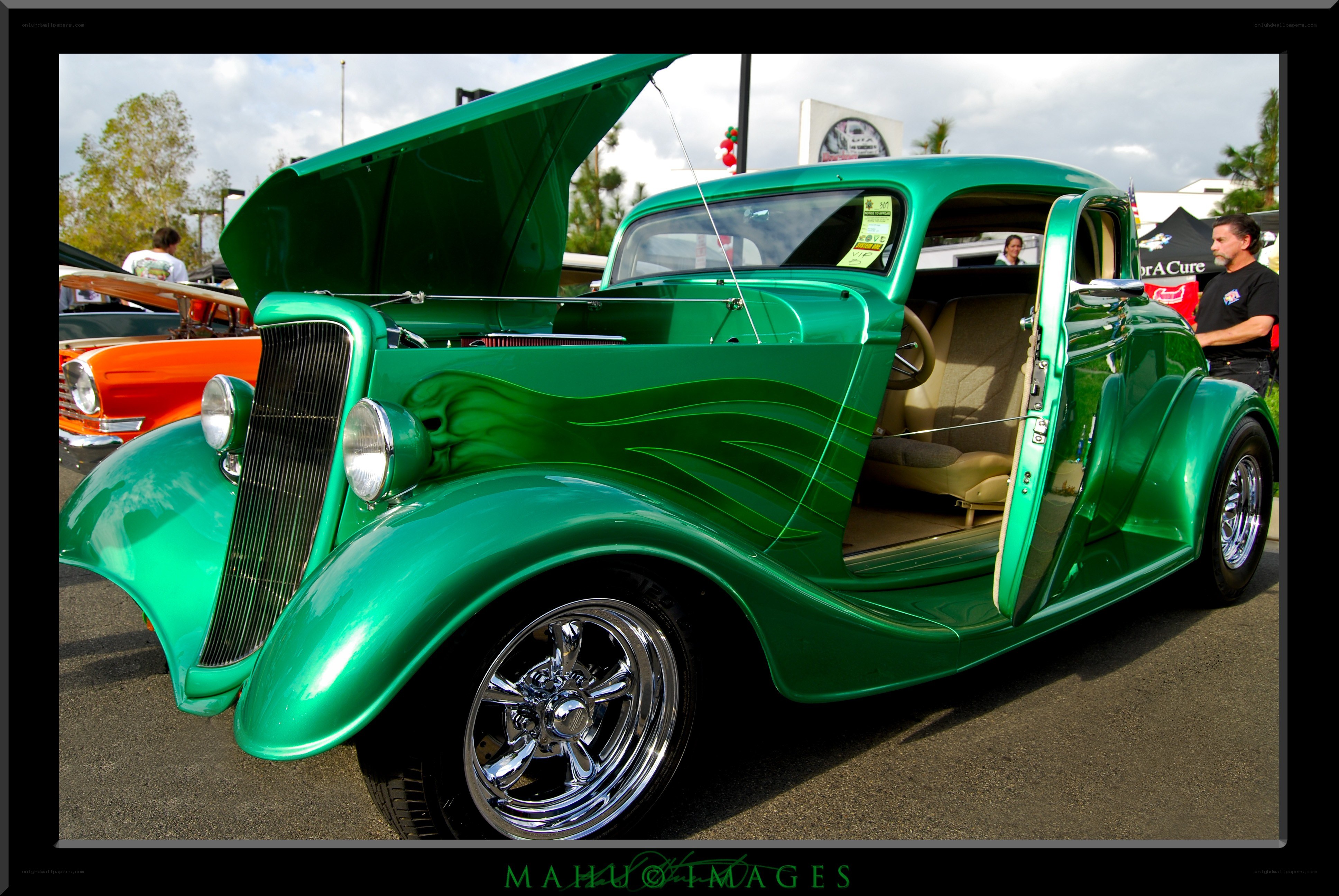 green classic car at show