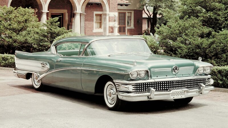 Green Classic Car — Calm, Afternoon, Photograph, Building, Trees, Road