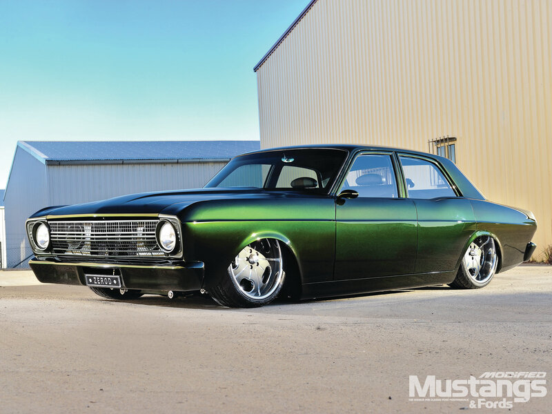 Green Classic Car — Dramatic, Afternoon, Photograph, Building