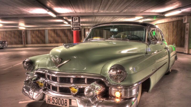 Green Classic Car — Dramatic, Photograph, Parking Garage
