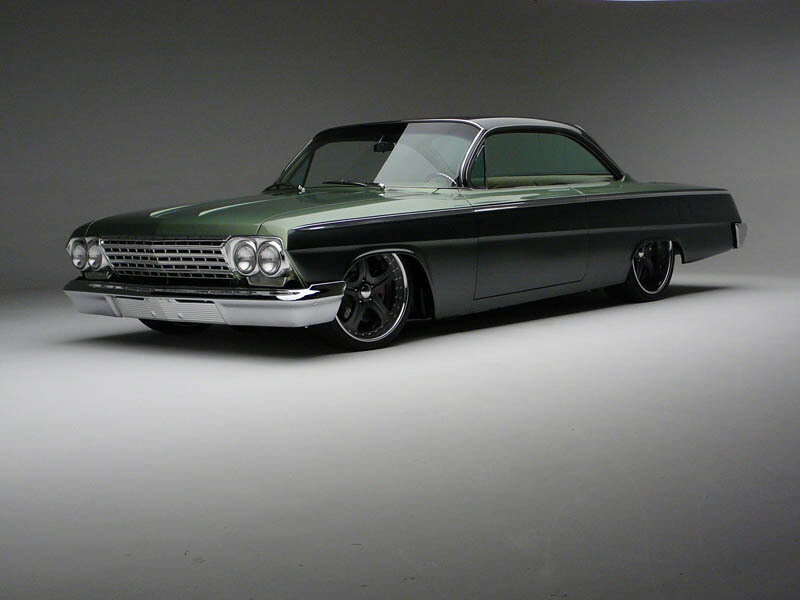 green classic car in studio