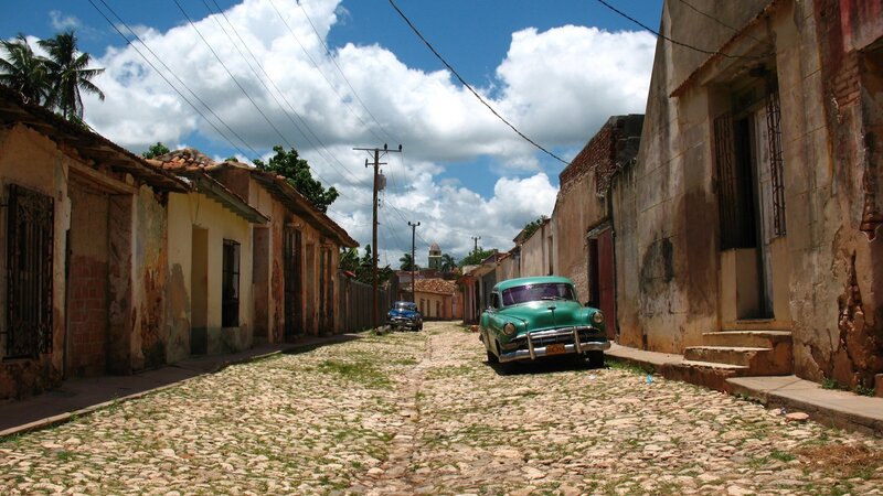 Green Classic Car on Street — Serene