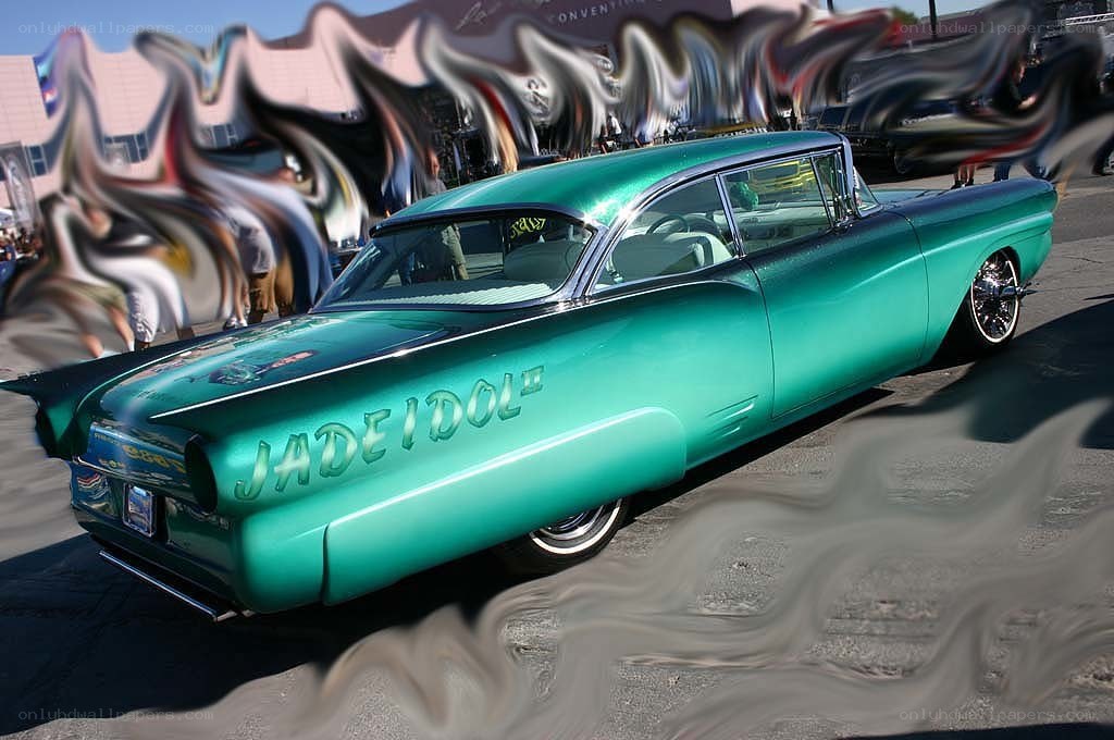 green classic car with custom paint