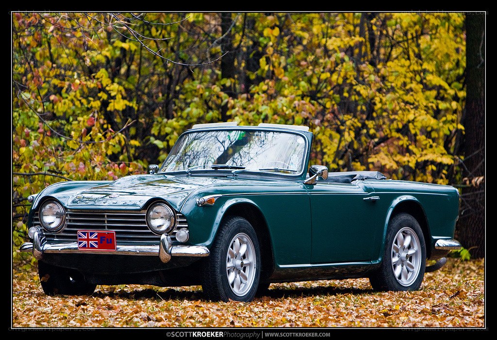 Green classic convertible in autumn