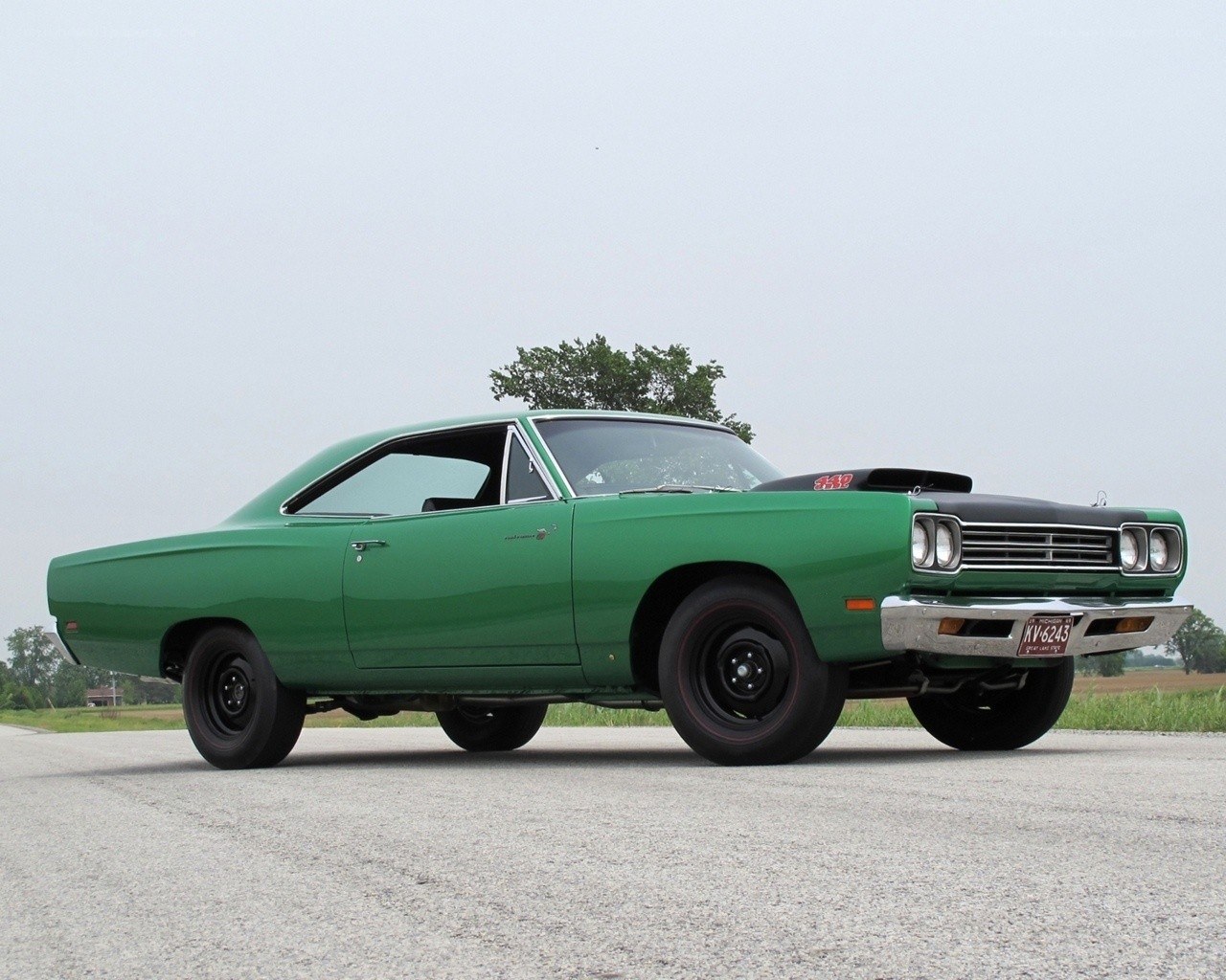 green classic muscle car