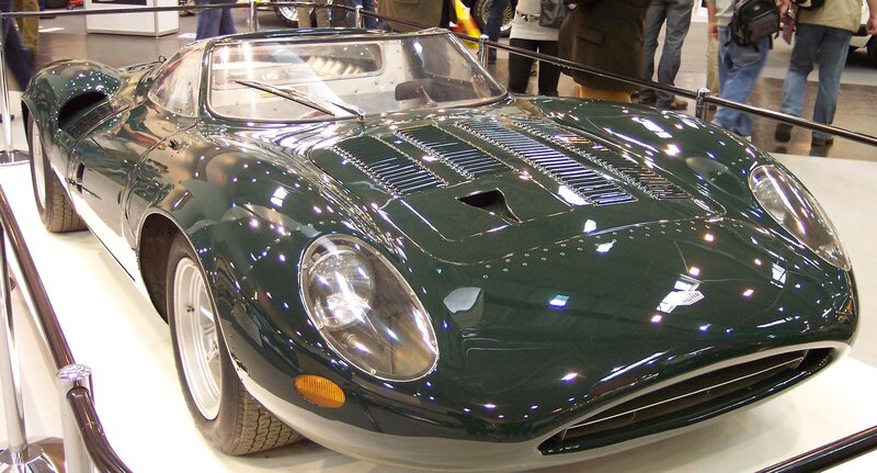 Green classic sports car on display
