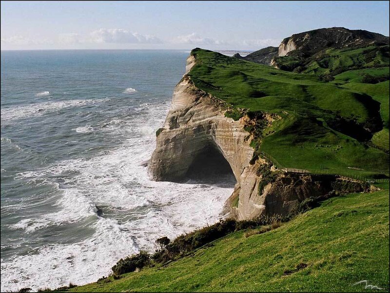Green Cliff with Sea Arch