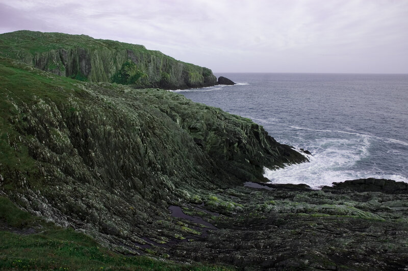 Green Cliffs by Ocean — Dramatic