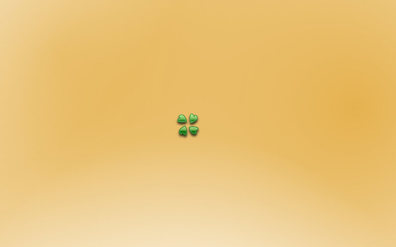 green clover icon on yellow background