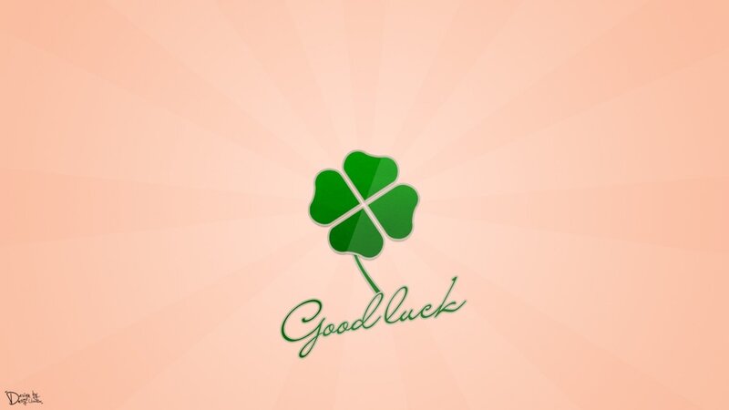 green clover with good luck text