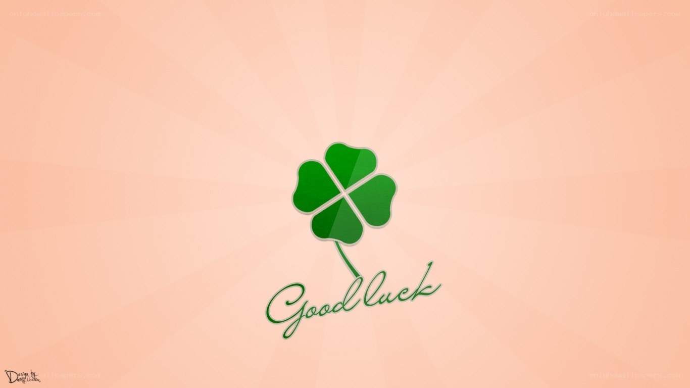 green clover with good luck text
