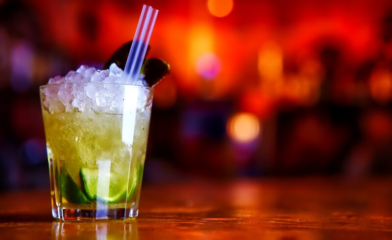Green Cocktail in Glass — Red