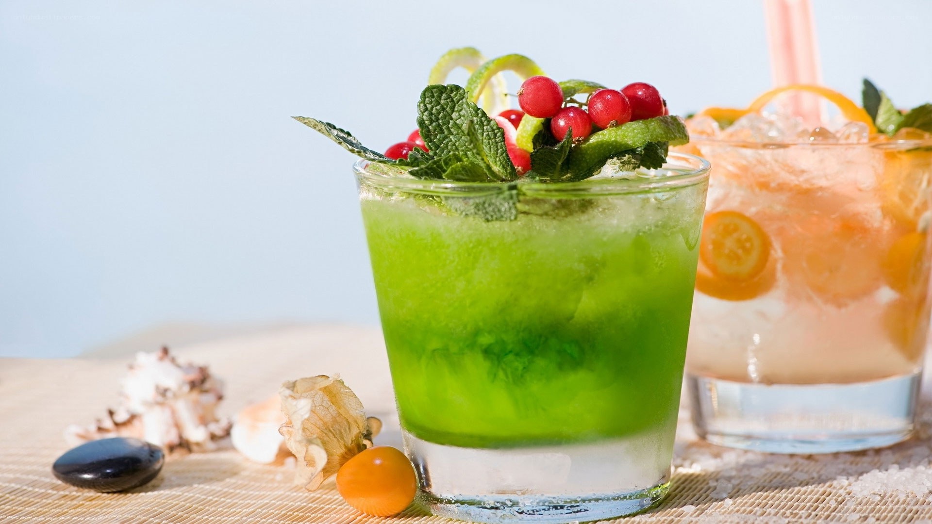 Green cocktail with berries