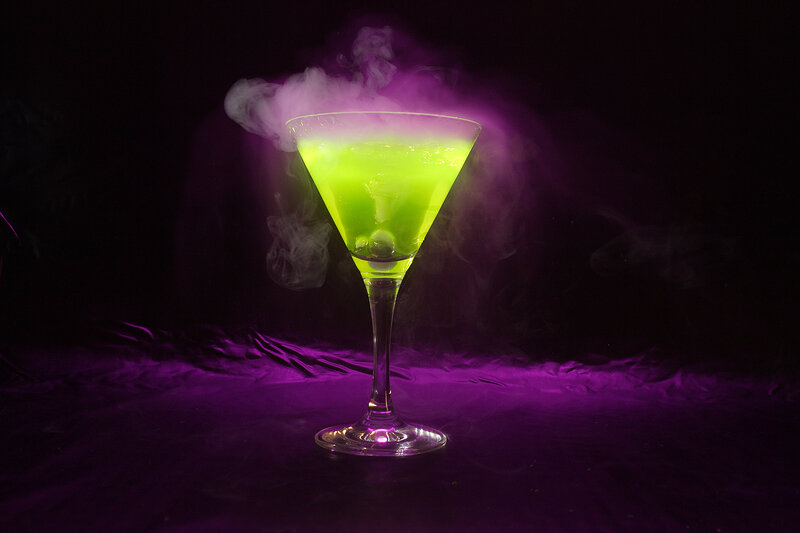green cocktail with smoke