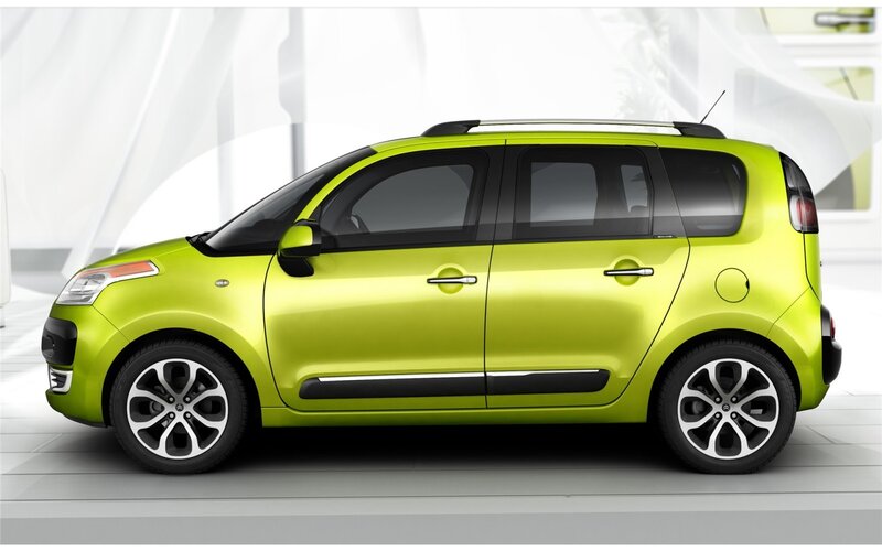 green compact car side view