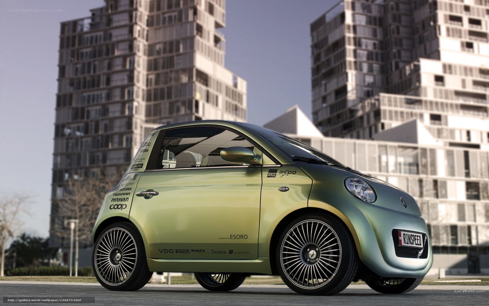 Green concept car in city