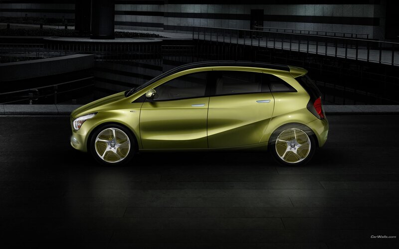 green concept car in dark setting