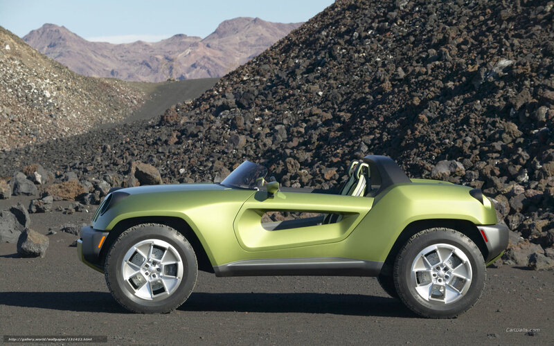 Green concept car in desert