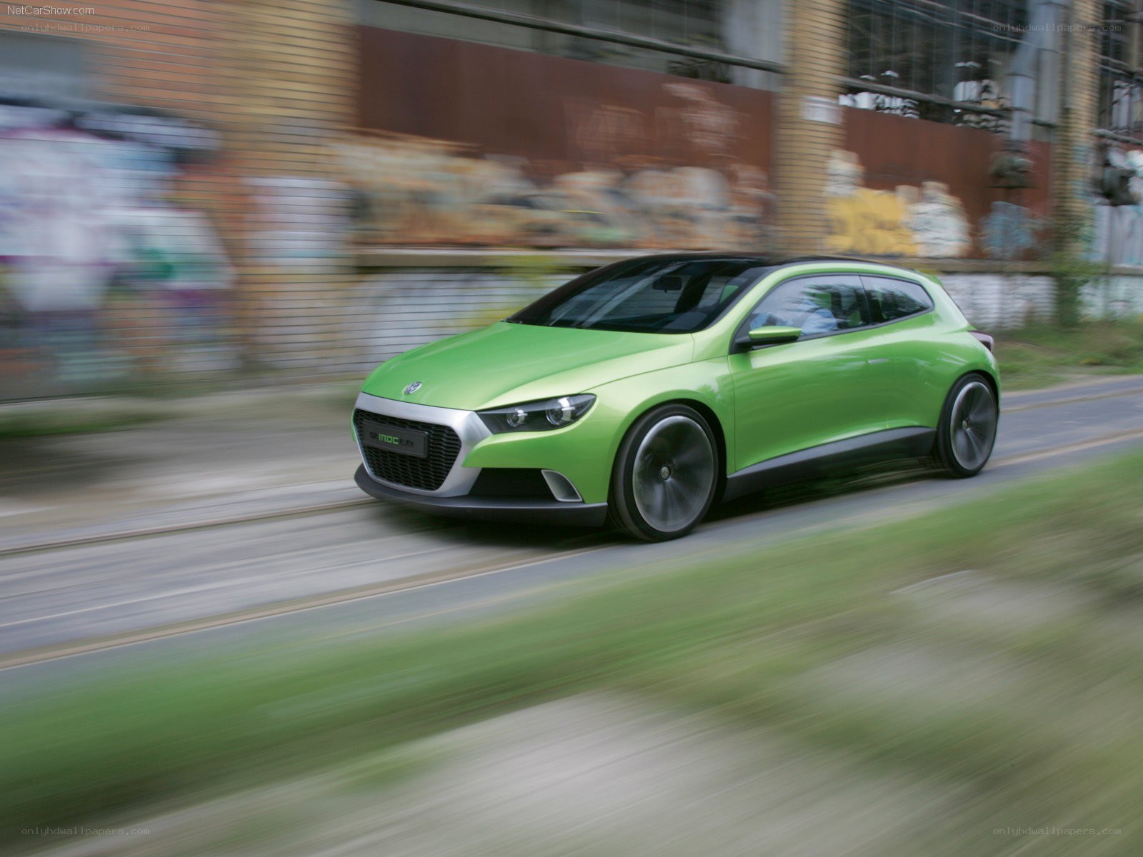 green concept car in motion