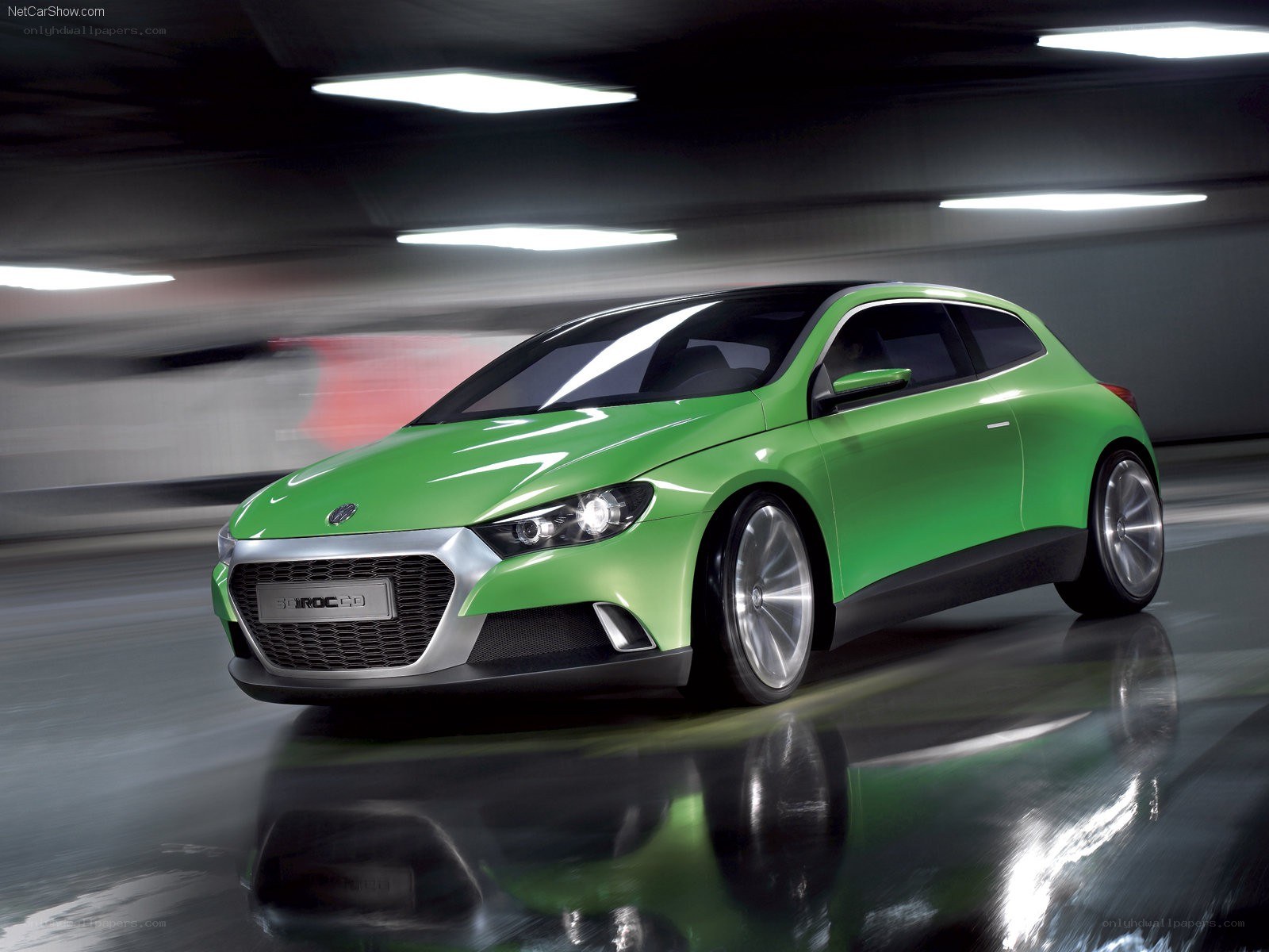 Green concept car in motion