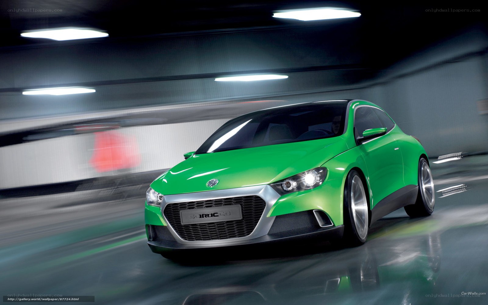 Green concept car in motion