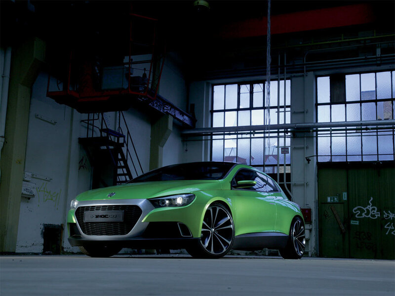 Green concept car in warehouse