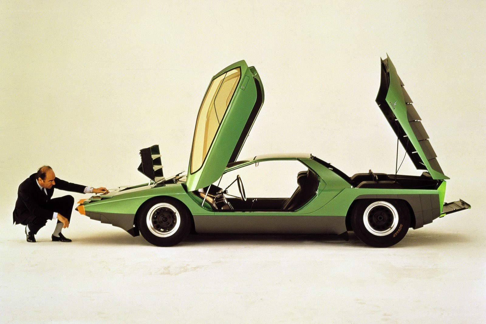 Green concept car with gullwing doors