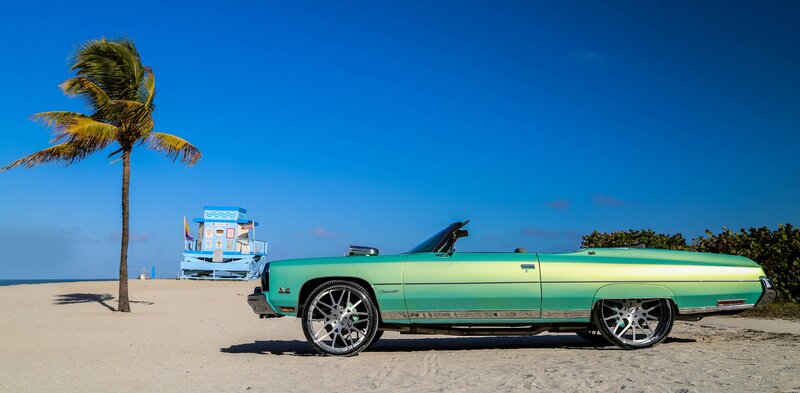 Green Convertible Car — Blue