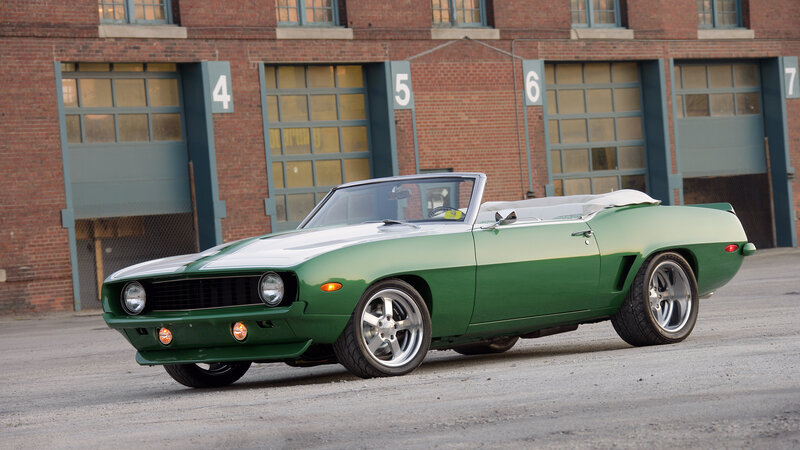 Green Convertible Car — Calm, Afternoon, Photograph, Brick Building