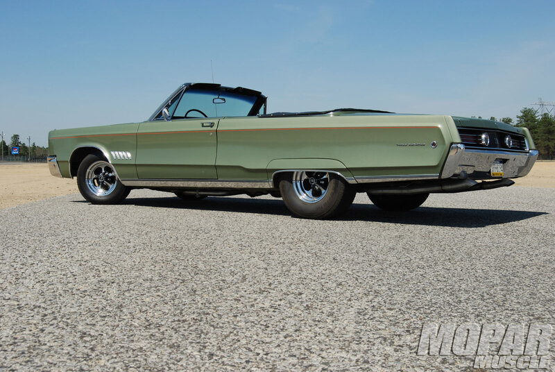 Green Convertible Car — Calm, Afternoon, Photograph, Road