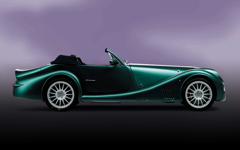 Green Convertible Sports Car — Dramatic, Photograph, Silver Wheels