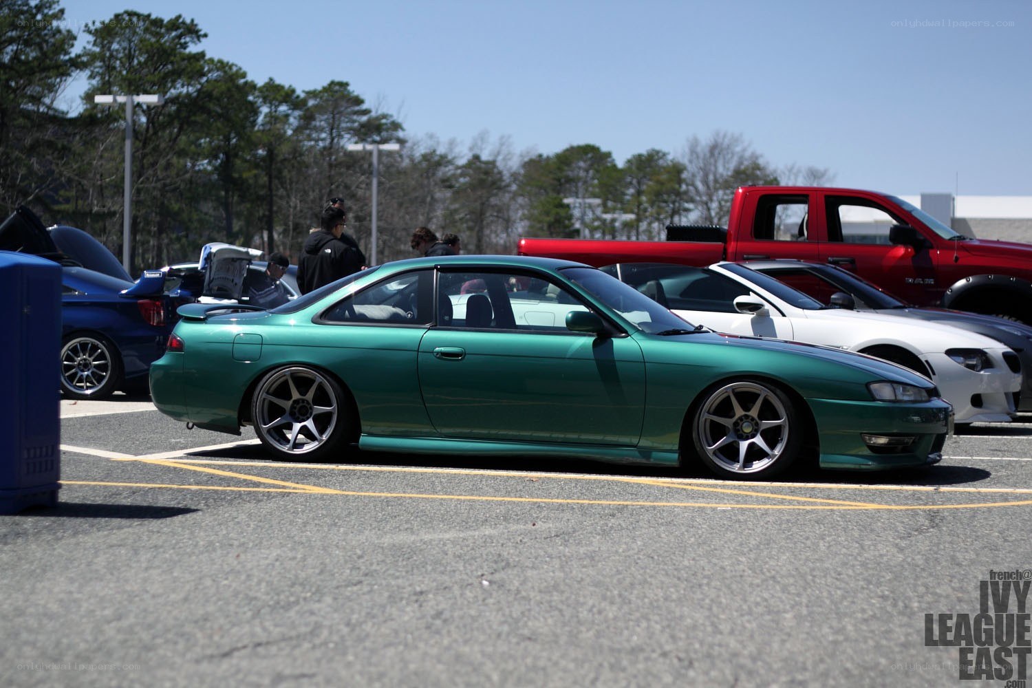 green coupe at car show