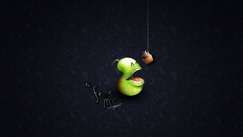 green creature eating cupcake