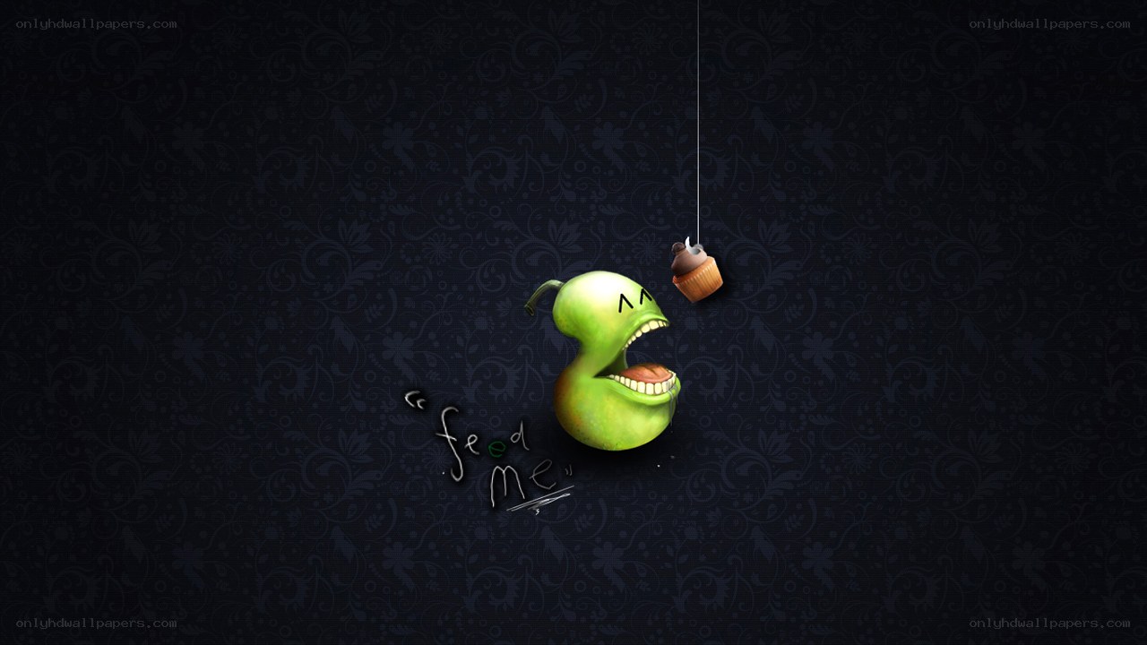 green creature eating cupcake