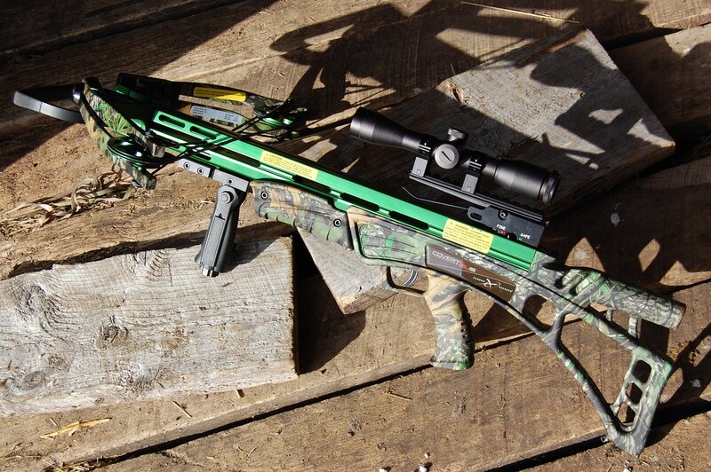 Green Crossbow on Wood