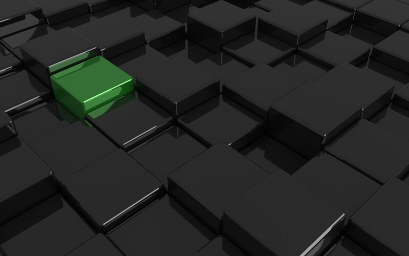 Green Cube on Black Cubes