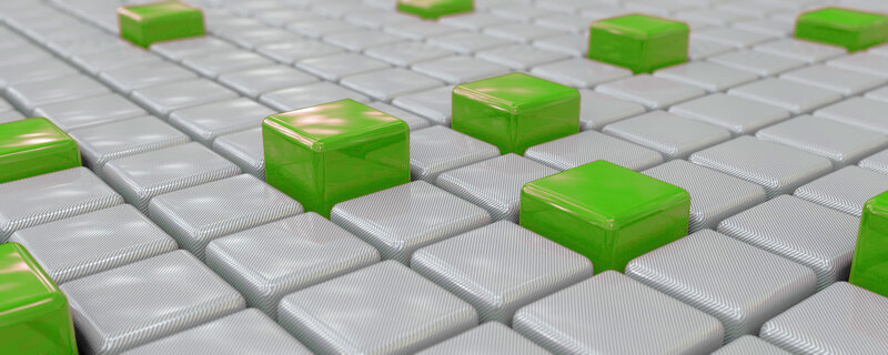 green cubes on gray grid