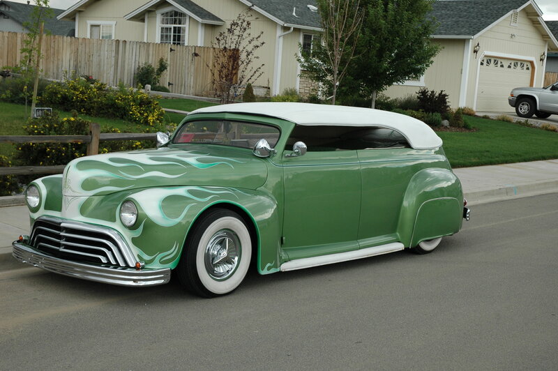 green custom car with flames