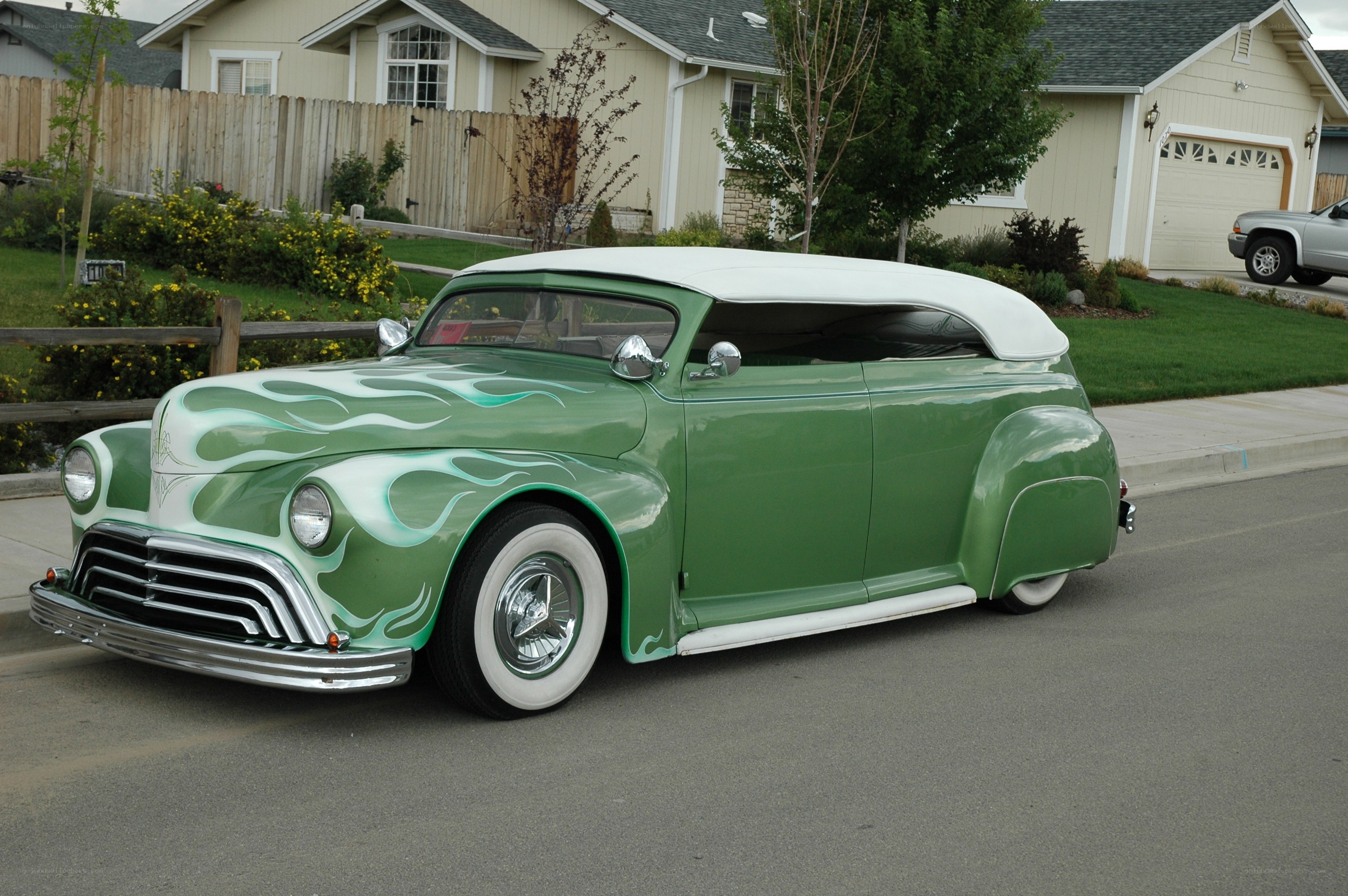 green custom car with flames