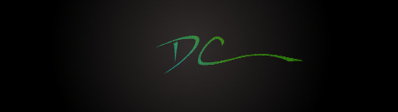 green DC logo on dark background