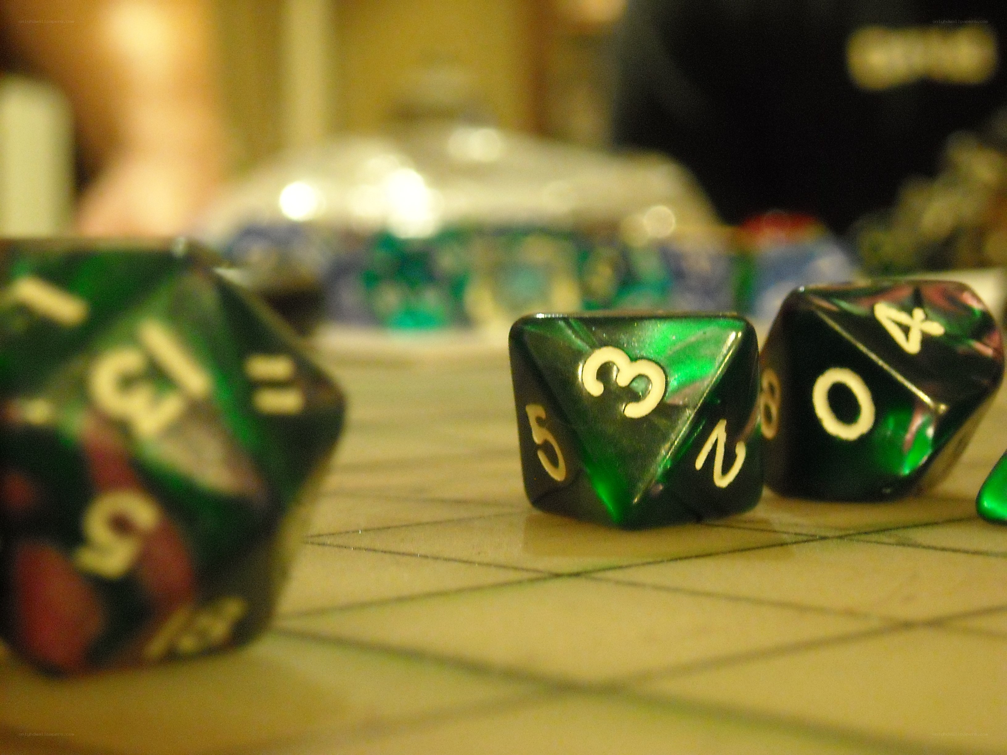 green dice on a game board