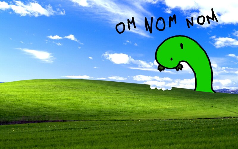 Green Dinosaur Eating Grass