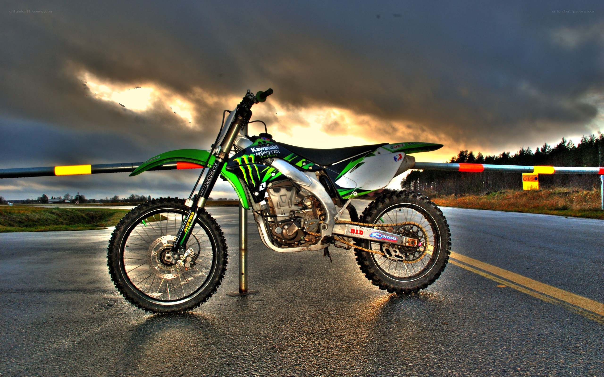 green dirt bike on road