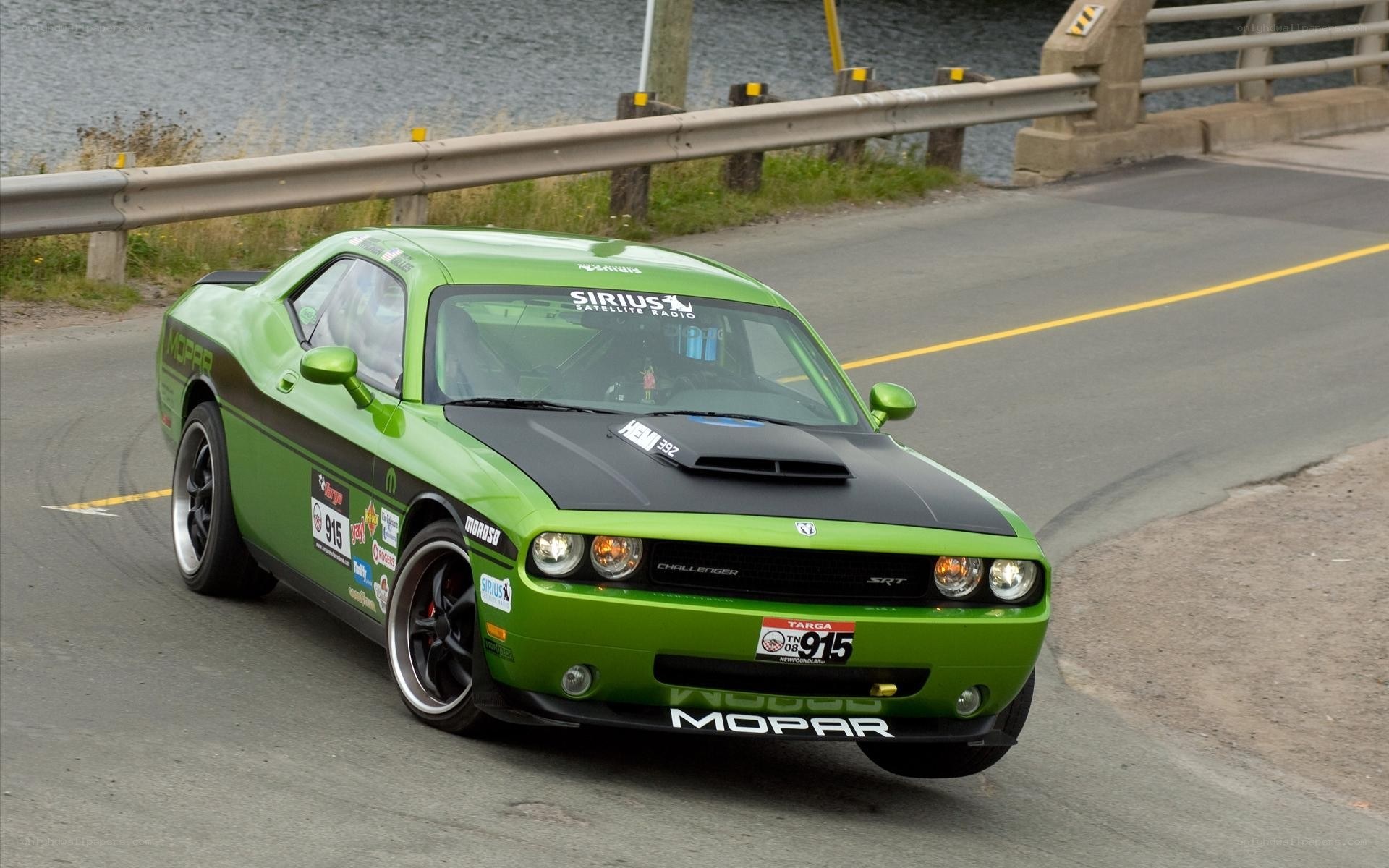 Green Dodge Challenger on track