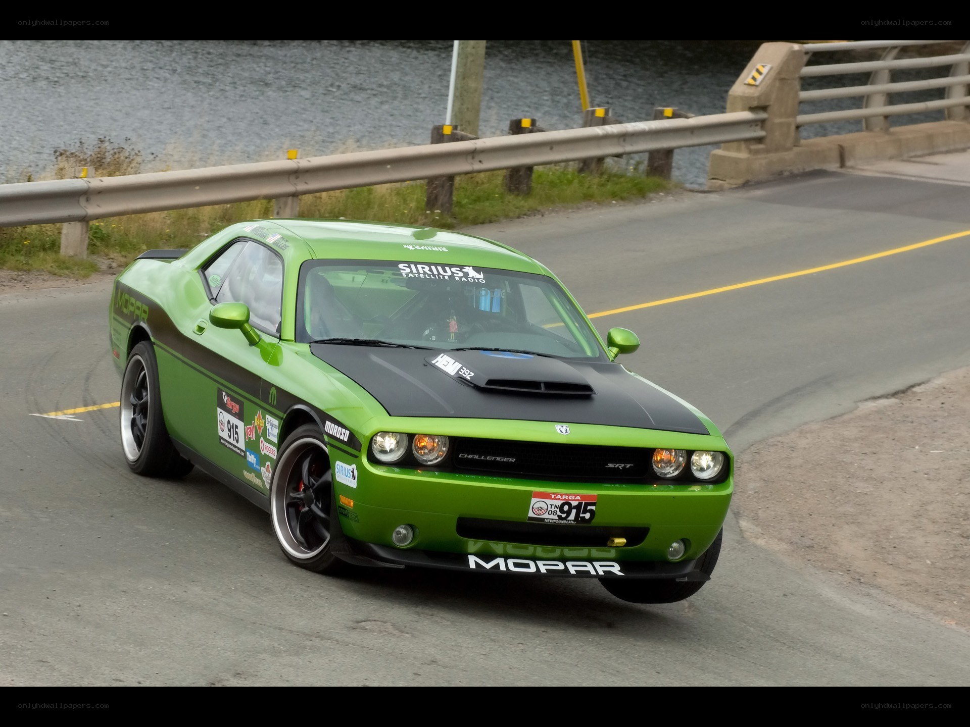 green dodge challenger srt on track