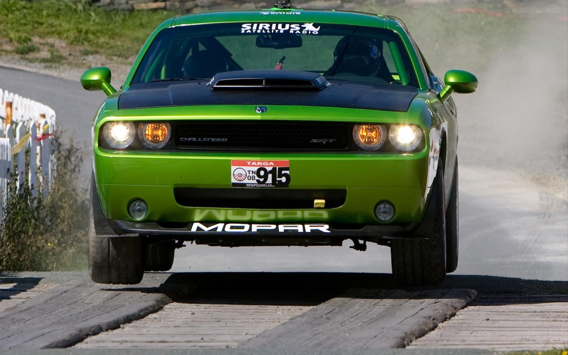 Green Dodge Challenger SRT racing