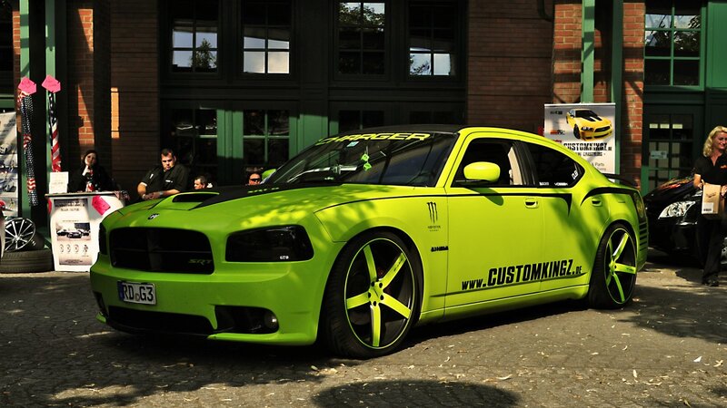 green dodge charger at car show