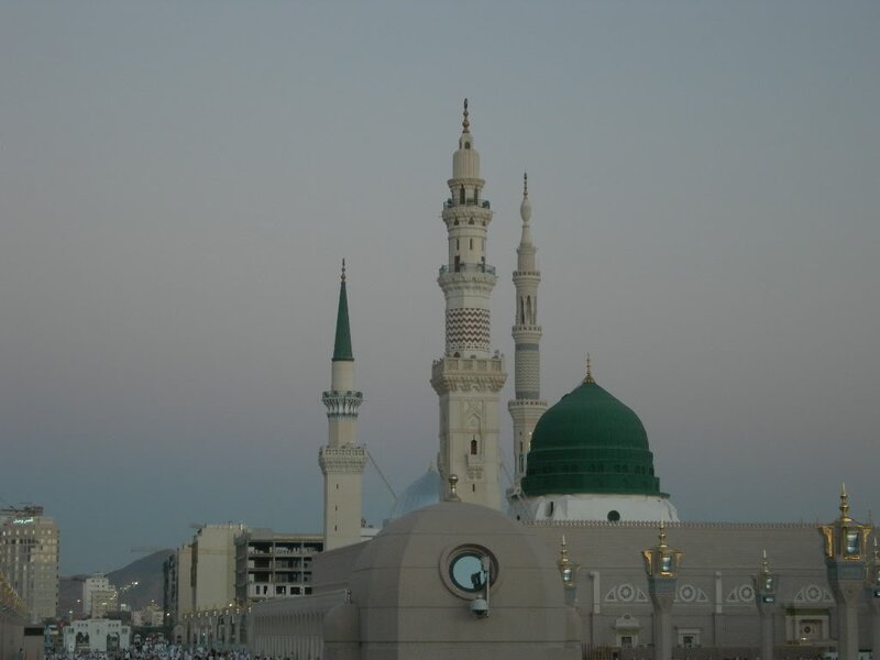 Green dome and minarets of a mosque